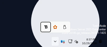 Step 2: the TranslucentTB icon starts in the tray overflow. Click the ^ arrow next to the clock to see it.