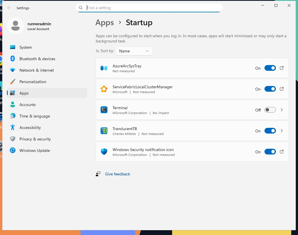 Settings › Apps › Startup right after installing: TranslucentTB is already On (the package registers an enabled startup task).