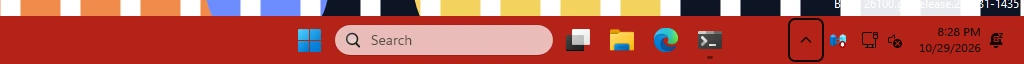 Real Windows taskbar: Before uninstalling: TranslucentTB running with a red opaque taskbar.